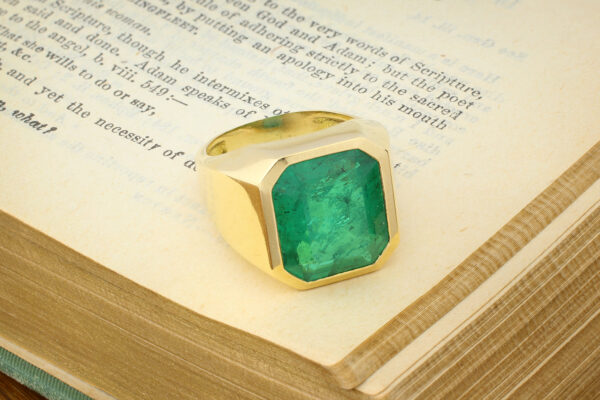 Emerald And Sculpted Gold Ring