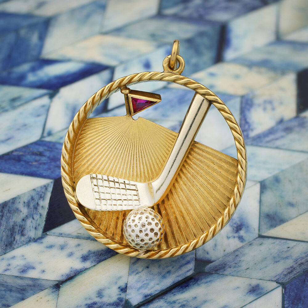 Van Cleef & Arpels ‘Golf’ Ruby and Gold Charm Pendant