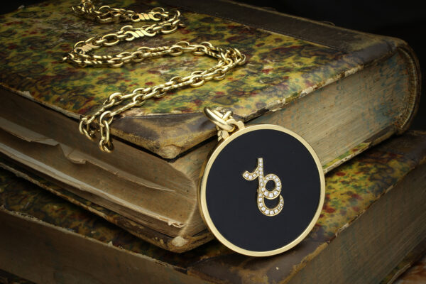 Bulgari Capricorn Zodiac Onyx, Diamond And Gold Pendant Necklace