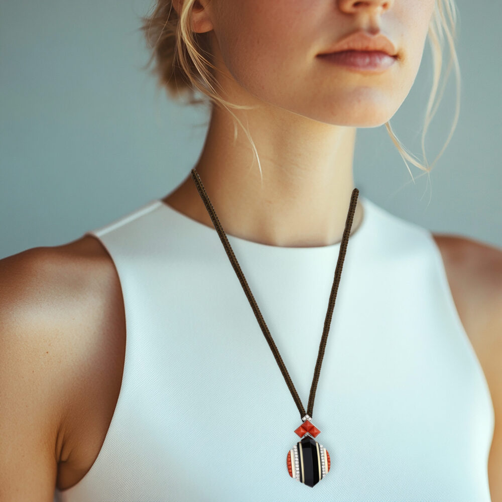 Boivin An Art Deco Diamond, Onyx and Coral Pendant Necklace