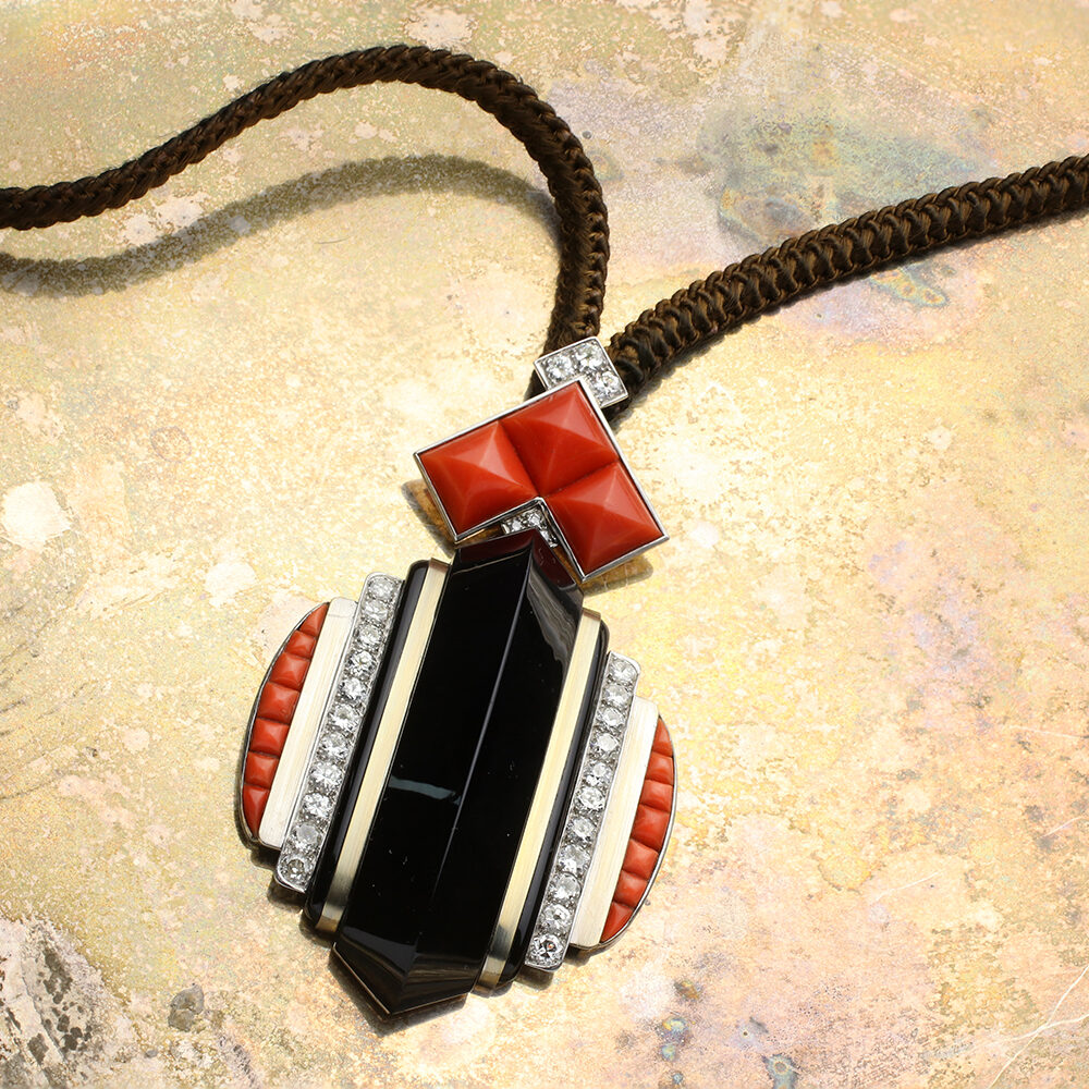 Boivin An Art Deco Diamond, Onyx and Coral Pendant Necklace