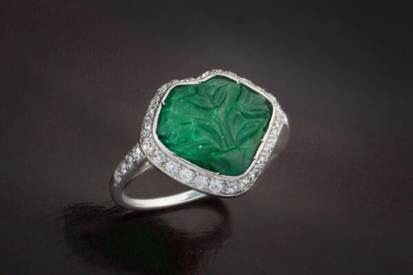 Art Deco Carved Emerald, Diamond And Enamel Ring