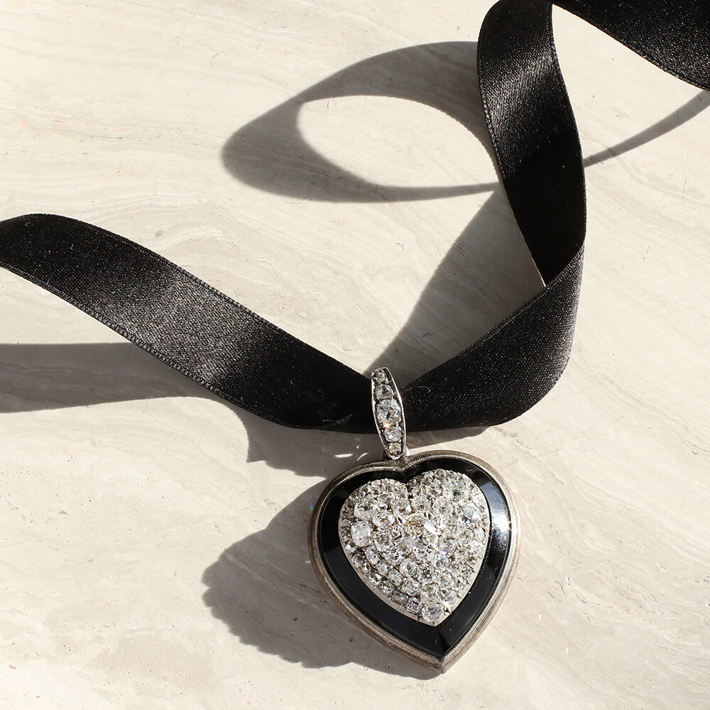 Diamond, Onyx and Platinum Heart Shaped Pendant