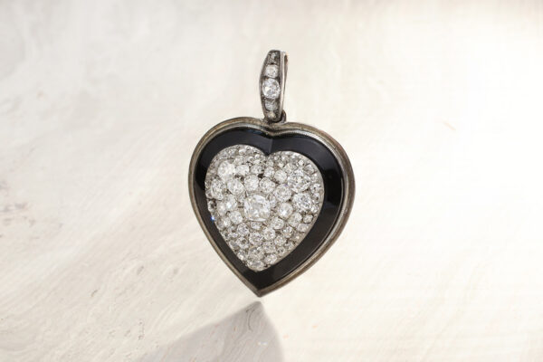 Diamond, Onyx And Platinum Heart Shaped Pendant
