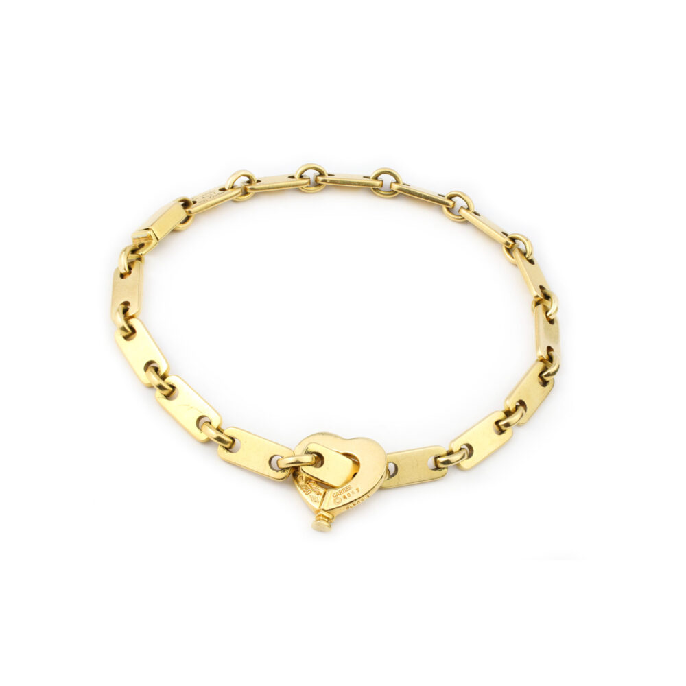 Cartier 'Fidelity' Gold Link Bracelet with Heart Key Pendant