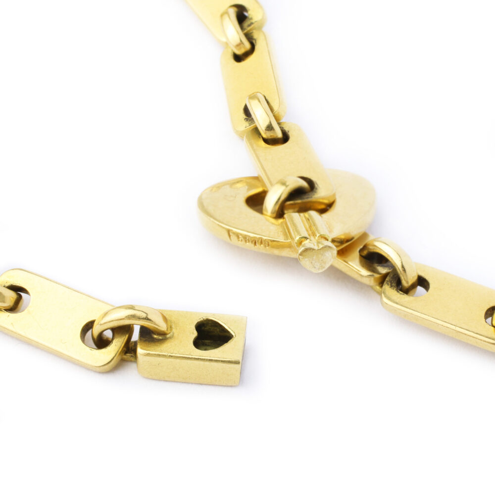Cartier 'Fidelity' Gold Link Bracelet with Heart Key Pendant