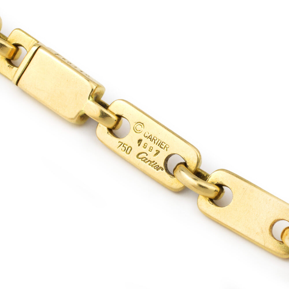 Cartier 'Fidelity' Gold Link Bracelet with Heart Key Pendant