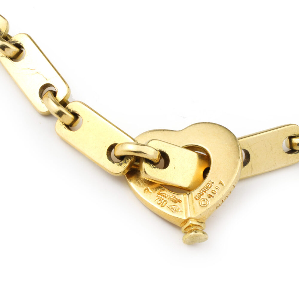 Cartier 'Fidelity' Gold Link Bracelet with Heart Key Pendant