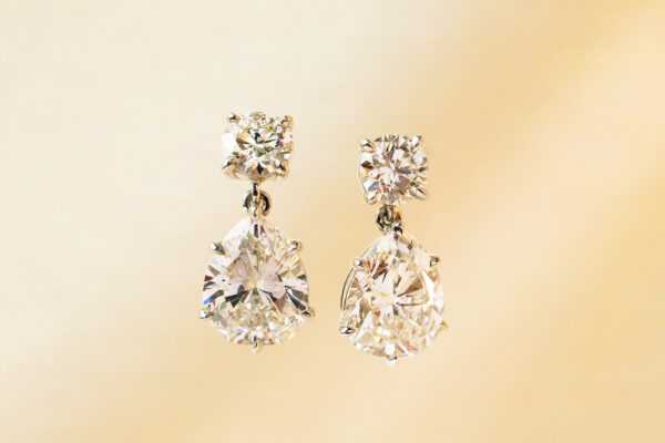 Round and Pear Shaped Diamond Ear Pendants