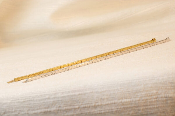 Cartier Pair of ‘ Laniere’ White and Yellow Gold Bracelets