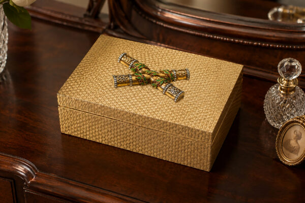 Stylized Epaulette Ornament on Cartier Gold Table Box
