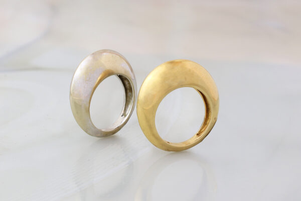 Van Cleef & Arpels Pair of White and Yellow Gold Domed Rings