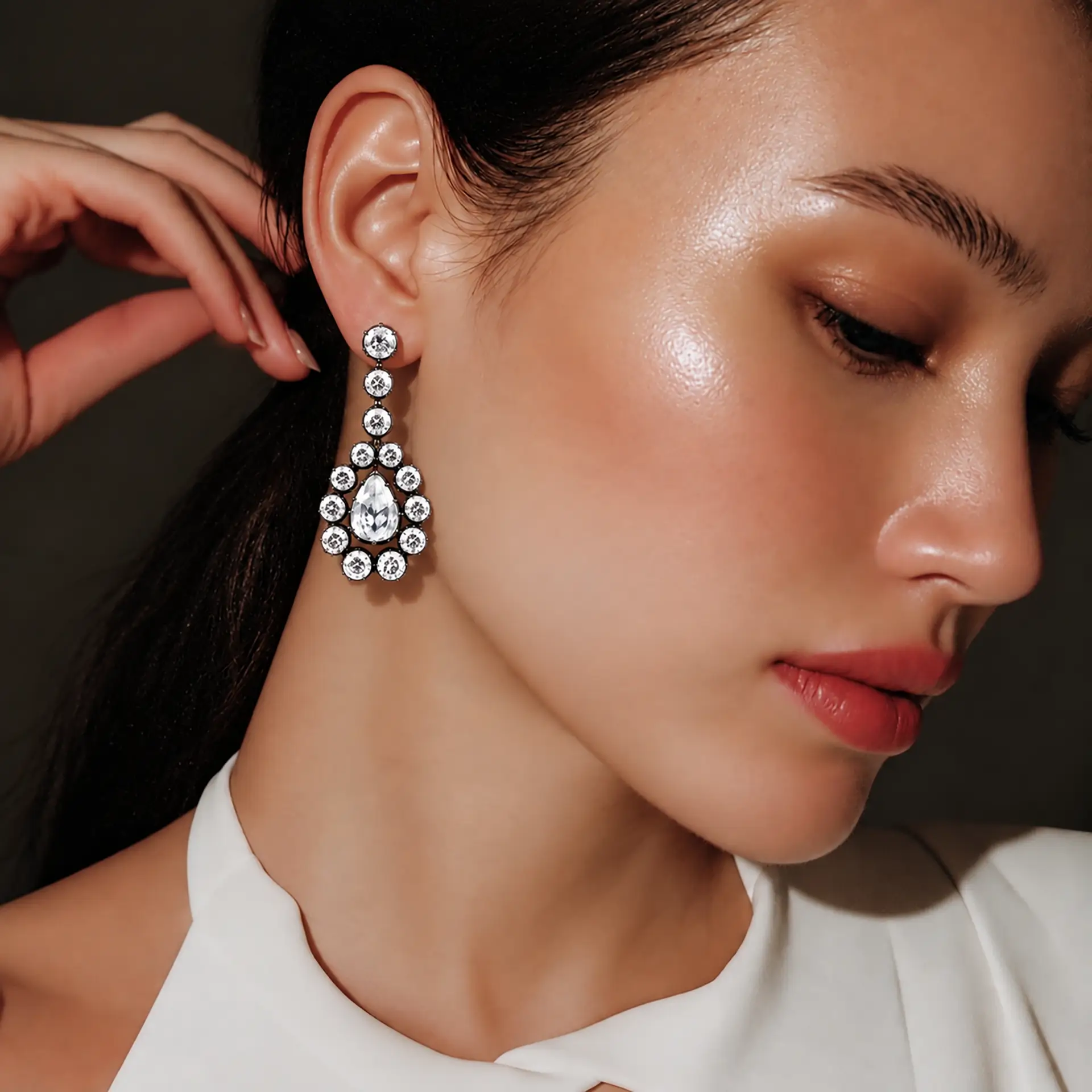 Elegant drop earrings with sparkling gemstones.