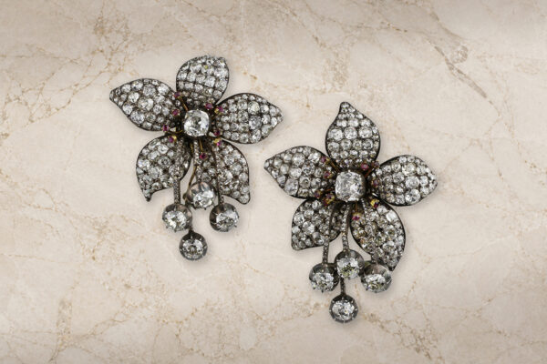 Antique Ruby and Diamond Floral Ear Clip» Price on Request «